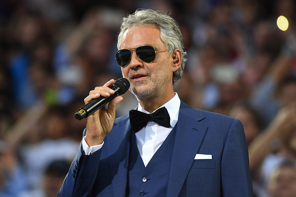 Italian classical singer Andrea Bocelli performs ahead of the start of the UEFA Champions League final football match between Real Madrid and Atletico Madrid at San Siro Stadium in Milan, on May 28, 2016. / AFP / GERARD JULIEN (Photo credit should read GERARD JULIEN/AFP/Getty Images)