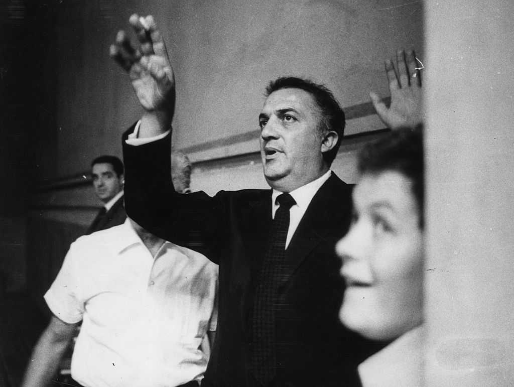 July 1964:  Federico Fellini (1920 - 1993) directing 'Giulietta Degli Spirits' (Juliet of the Spirits)  (Photo by Marco Emili/Keystone/Getty Images)