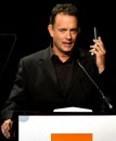 Tom Hanks, jokes while talking with Elizabeth Taylor over the mobile phone, 07 ott 2002